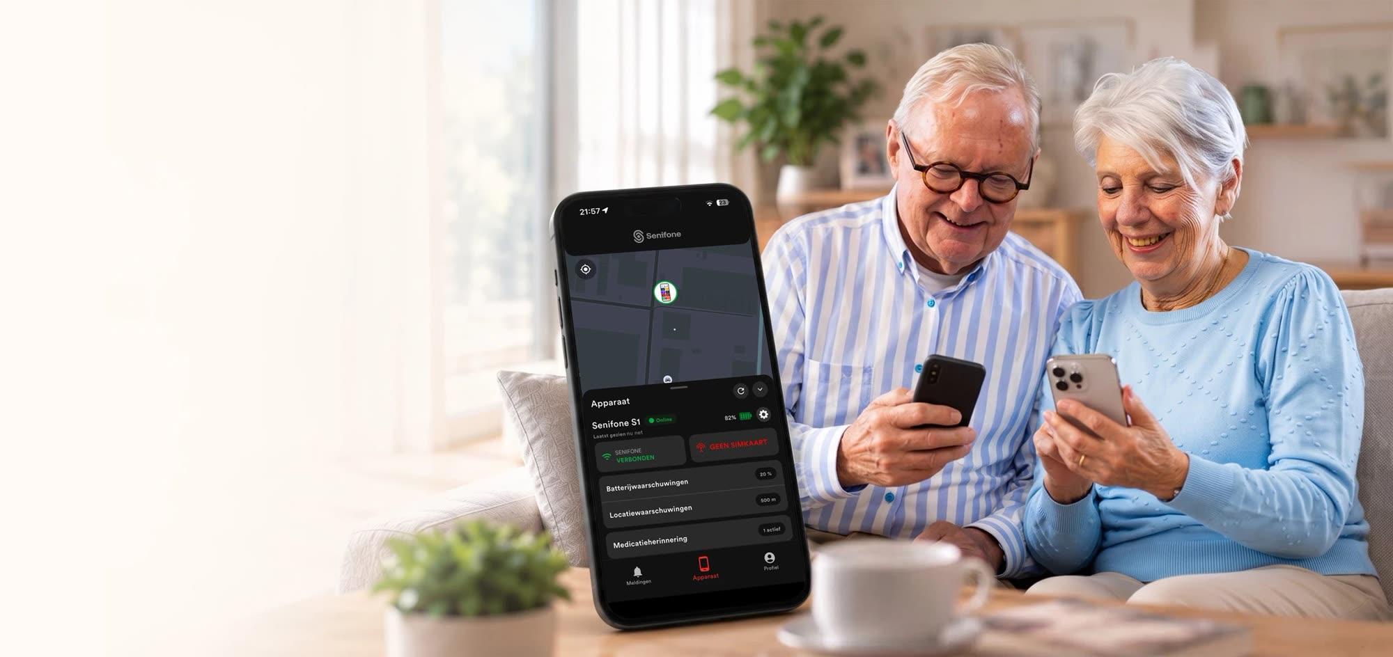 Senior couple smiling at their smartphones on a sofa, next to a phone showing the Senifone Companion App